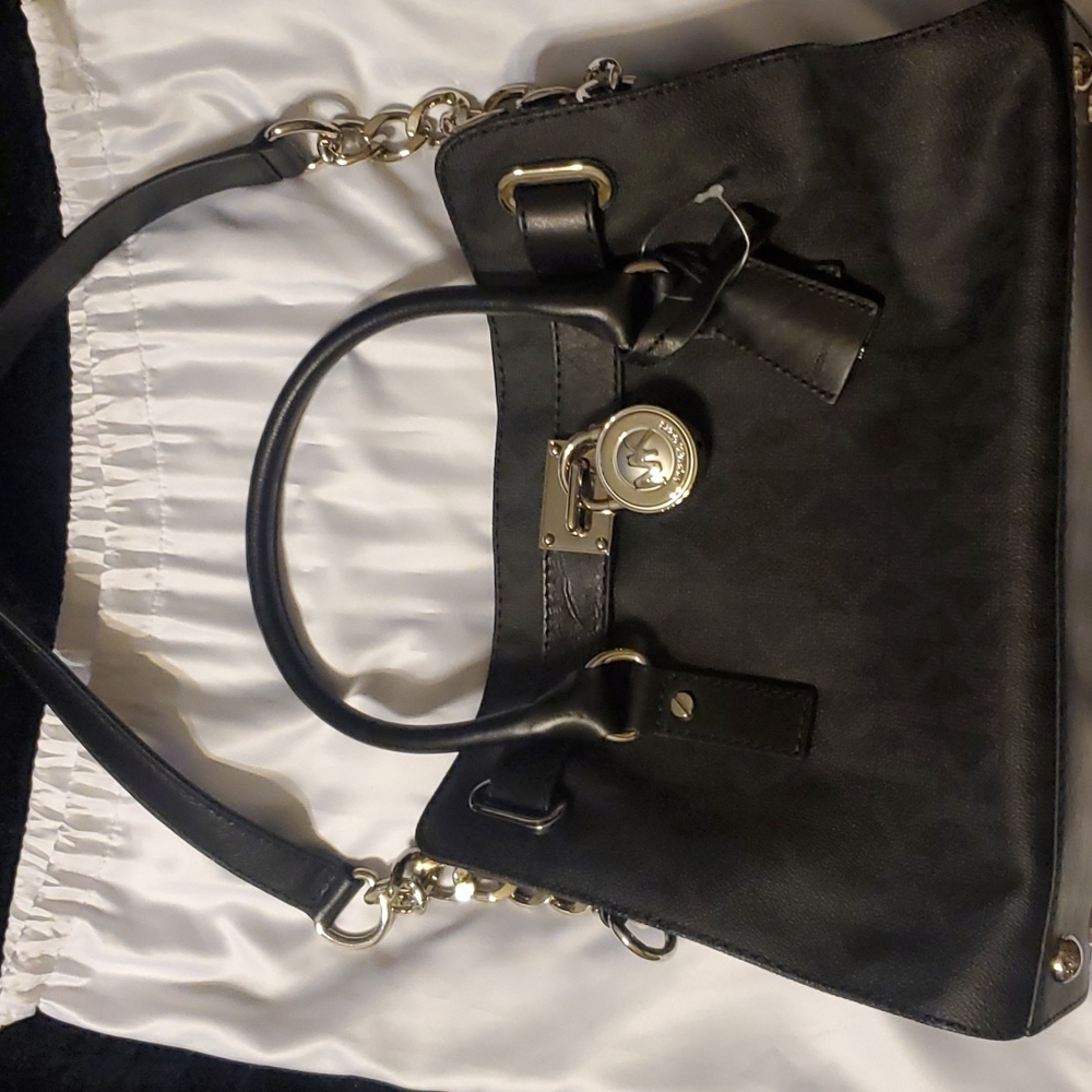 Brand new with tags.Michael Kors Hamilton Black EW Satchel with dustbag.